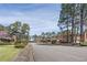 Neighborhood street displaying charming homes, mature trees, and well-kept lawns, offering a serene environment at 3346 Stonecrest Ct, Atlanta, GA 30341