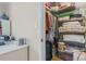 Walk-in closet with ample shelving providing plenty of storage space at 3346 Stonecrest Ct, Atlanta, GA 30341