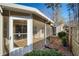 Charming backyard view from screened porch, showcasing well-maintained landscaping and tranquil outdoor space at 4071 Cottage Oaks Dr # 3, Acworth, GA 30101