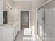 This spacious bathroom features double sink vanity, shower and walk-in closet at 4071 Cottage Oaks Dr # 3, Acworth, GA 30101