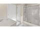 Bright bathroom with updated vanity, sink, shower and tile flooring at 4071 Cottage Oaks Dr # 3, Acworth, GA 30101