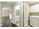 Convenient laundry room near bathroom featuring a washer and dryer, and functional white cabinets for storage at 4071 Cottage Oaks Dr # 3, Acworth, GA 30101