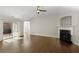 Spacious living room with hardwood floors, ceiling fan, fireplace and sliding door access to the outside at 4071 Cottage Oaks Dr # 3, Acworth, GA 30101