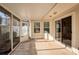 Relaxing screened porch with ample space for outdoor seating and entertaining, with views of the backyard at 4071 Cottage Oaks Dr # 3, Acworth, GA 30101