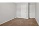 Bedroom with neutral walls, carpeted floor and two closets at 2279 Perch Sw Way, Marietta, GA 30008