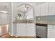 Well-appointed kitchen with granite countertops, stainless steel dishwasher, and tiled backsplash at 2279 Perch Sw Way, Marietta, GA 30008
