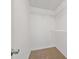Walk-in closet featuring white walls and wire shelving for optimal organization at 2279 Perch Sw Way, Marietta, GA 30008