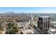 Extensive aerial view of city skyline, highlighting the building's location and neighborhood surroundings at 2425 Peachtree Ne Rd # 1705, Atlanta, GA 30305