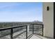 Private balcony with glass railings offering stunning city skyline views and a relaxing outdoor space at 2425 Peachtree Ne Rd # 1705, Atlanta, GA 30305