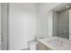 Modern bathroom featuring a sleek vanity, toilet, and a glass-enclosed shower with tile surround at 2425 Peachtree Ne Rd # 1705, Atlanta, GA 30305
