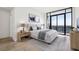 Cozy bedroom featuring neutral tones, ample natural light, and scenic outdoor views at 2425 Peachtree Ne Rd # 1705, Atlanta, GA 30305