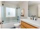 Bathroom with a shower-tub combo, a modern vanity, and a toilet at 243 Sterling St, Decatur, GA 30030