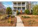 Beautiful two-story home with a front yard and mailbox leading to a front porch at 243 Sterling St, Decatur, GA 30030