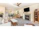 Bright living room with a fireplace, a ceiling fan, and hardwood floors at 243 Sterling St, Decatur, GA 30030