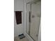 Clean bathroom featuring a glass shower door, towel bar, neutral colors, and a scale at 5250 Fieldgate Ridge Dr, Cumming, GA 30028