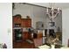 Well-equipped kitchen featuring dark cabinetry and stainless steel appliances at 5250 Fieldgate Ridge Dr, Cumming, GA 30028