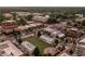 Aerial view showcasing community's vibrant town square with green space at 7230 Summit Pl, Alpharetta, GA 30009