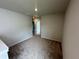 Cozy bedroom featuring neutral walls, plush carpeting and view to hall at 255 Depot Landing Rd # 38, Auburn, GA 30011