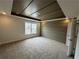 Stylish bedroom features a decorative tray ceiling and large window offering great natural light at 255 Depot Landing Rd # 38, Auburn, GA 30011