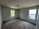 This bedroom offers large windows with natural light to create a bright and airy space at 255 Depot Landing Rd # 38, Auburn, GA 30011