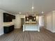 Well-designed kitchen with ample storage, granite countertops and wood flooring throughout at 255 Depot Landing Rd # 38, Auburn, GA 30011