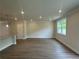 Bright and airy living room with recessed lighting and hardwood flooring at 255 Depot Landing Rd # 38, Auburn, GA 30011