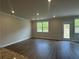 Living room featuring recessed lighting and hardwood flooring with views to the yard at 255 Depot Landing Rd # 38, Auburn, GA 30011