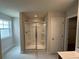 Modern bathroom showcases a spacious walk-in shower with clear glass doors and tile surround at 255 Depot Landing Rd # 38, Auburn, GA 30011