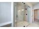 Modern bathroom with glass shower enclosure, tiled walls, built-in bench, and sleek hardware at 255 Depot Landing Rd # 38, Auburn, GA 30011