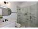 Modern bathroom featuring a marble-tiled shower and sleek black fixtures at 3395 Lee St, East Point, GA 30344