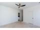 Spacious room with modern ceiling fan, bathroom access, and bright lighting at 3395 Lee St, East Point, GA 30344