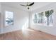 Bright bedroom featuring hardwood floors, neutral tones, and large windows providing ample natural light at 3395 Lee St, East Point, GA 30344