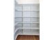 A close-up of shelving inside of a large, spacious, walk-in closet at 3395 Lee St, East Point, GA 30344
