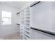 A spacious walk-in closet with custom shelving and ample storage at 3395 Lee St, East Point, GA 30344