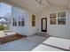 Bright, covered patio featuring modern lighting and backyard view at 3395 Lee St, East Point, GA 30344