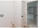 Hallway leading to the closet with a utility hookup at 3395 Lee St, East Point, GA 30344