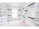 Spacious walk-in closet with custom shelving and ample storage space at 3395 Lee St, East Point, GA 30344