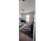 Cozy bedroom with a bunk bed, dark rug, and window with natural light at 75 Doves Nest, Covington, GA 30016