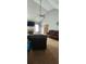 Living Room featuring high ceilings, fan, fireplace, and comfortable brown leather sofas at 75 Doves Nest, Covington, GA 30016