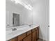 Bright bathroom features double sink vanity, creating a functional and airy atmosphere in the home at 232 Hunt Ne St, Marietta, GA 30060