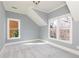 Bright bedroom with large windows and plush carpet at 232 Hunt Ne St, Marietta, GA 30060