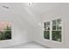 Bright bedroom with natural light, features neutral carpet, creating a welcoming and airy atmosphere in the home at 232 Hunt Ne St, Marietta, GA 30060