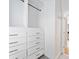 Custom closet design with ample built-in shelving and storage space for organization at 232 Hunt Ne St, Marietta, GA 30060