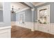 Formal dining room with hardwood floors, crown molding, and natural light at 232 Hunt Ne St, Marietta, GA 30060
