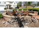 Community fire pit area with seating and woodpile, perfect for outdoor gatherings at 232 Hunt Ne St, Marietta, GA 30060