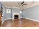 Cozy living room with fireplace, hardwood floors, and natural light at 232 Hunt Ne St, Marietta, GA 30060
