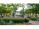 Town square with fountain, walking paths, park benches and green space at 232 Hunt Ne St, Marietta, GA 30060