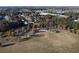 A high-angle aerial view showing a park nestled among houses and roads, offering a balance of nature and community at 912 Tanners Point Dr, Lawrenceville, GA 30044