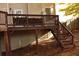 Wooden deck with stairs leading down to the backyard, offering ample space for outdoor activities at 912 Tanners Point Dr, Lawrenceville, GA 30044