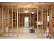 Spacious unfinished basement with wooden framing, offering potential for various custom layouts at 912 Tanners Point Dr, Lawrenceville, GA 30044